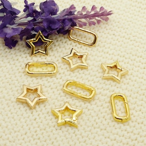 May include: Gold-toned metal star-shaped and rectangular clasps. These clasps are perfect for adding a touch of elegance to your jewelry or craft projects.