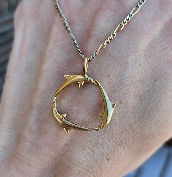 14k yellow gold dolphin circle pendant - image 1