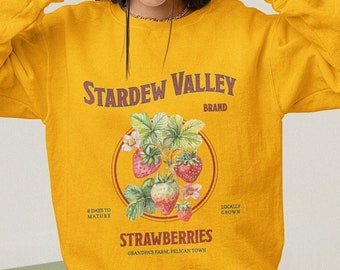 Felpa unisex di Stardew Valley, regalo alla moda per videogiocatori, comoda per i gamer, Pelican Town, maglietta con grafica di fragole, merchandising di Stardew Valley