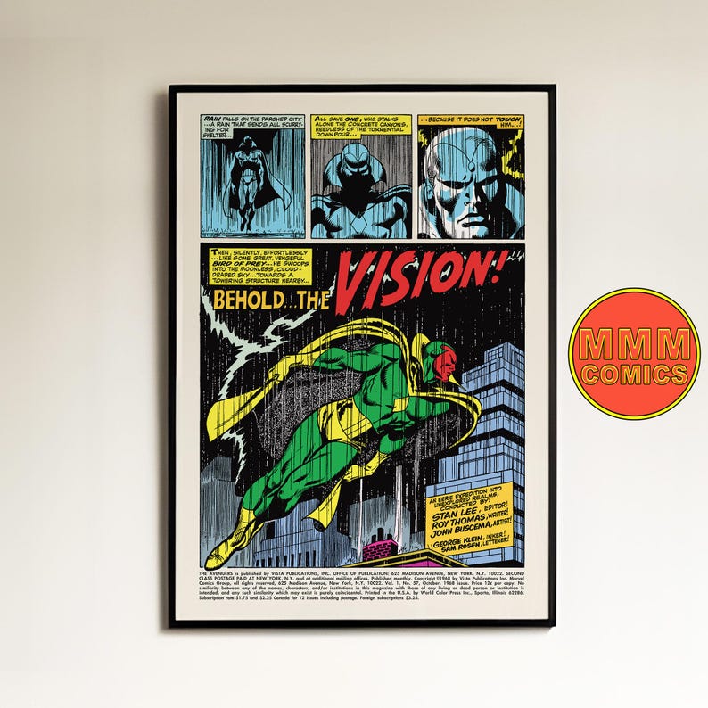 May include: Framed comic book art featuring a panel from The Vision. The artwork shows a green and yellow superhero flying over a city, with the text "BEHOLD... THE VISION!" The piece is framed in black and includes the "MMM COMICS" logo.