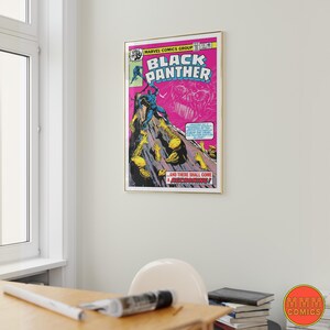 May include: A vintage comic book cover featuring Black Panther in a blue suit, standing on a rocky cliff. The cover is pink with yellow and black accents. The text "Black Panther" is in a bold, white font. The text "And there shall come a reckoning!" is in a smaller, white font.