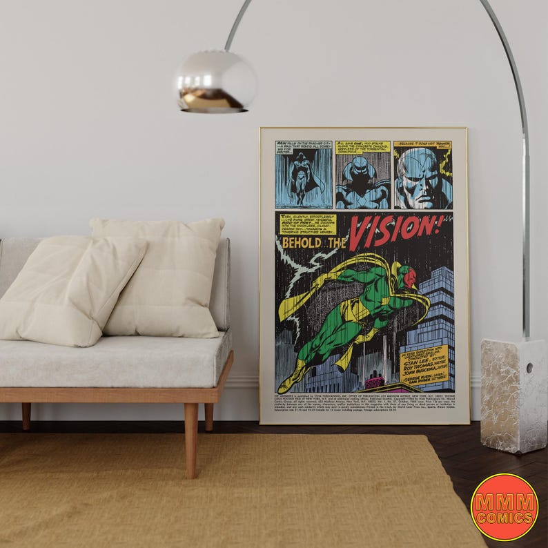 May include: A framed comic book page featuring the character Vision. The artwork showcases Vision in flight, with a green and yellow costume. The text "BEHOLD THE VISION!" is prominently displayed, with additional panels above.