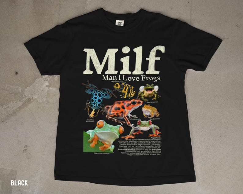 May include: Black t-shirt with the text "Milf Man I Love Frogs" in white. The shirt features a graphic of various colorful frogs with scientific names. The word "BLACK" is printed at the bottom left.