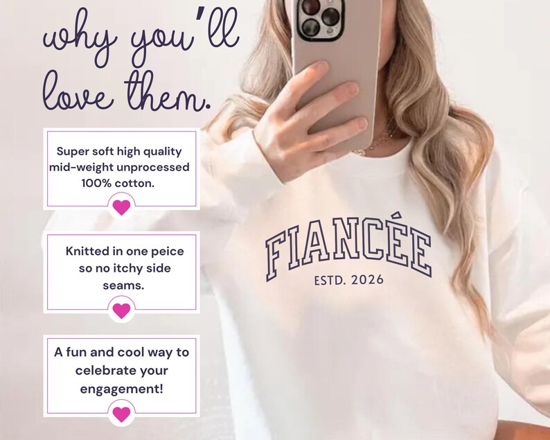 May include: White sweatshirt with the word "FIANC&Eacute;E" in navy blue block letters and "ESTD. 2026" underneath. The sweatshirt is made of 100% cotton and is a fun way to celebrate an engagement.