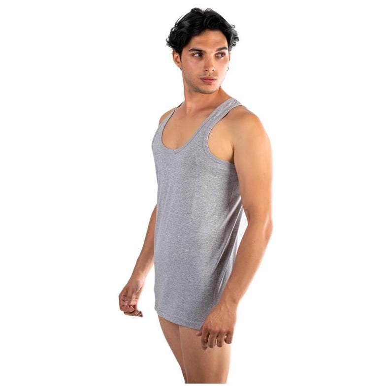 May include: A grey sleeveless undershirt with a scoop neck.
