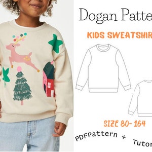 Puede incluir: Un patrón PDF y un tutorial para una sudadera para niños con un diseño festivo que incluye un reno, un árbol de Navidad y una casa. El patrón está disponible en las tallas 80-164. Dogan Pattern KIDS SWEATSHIRT.