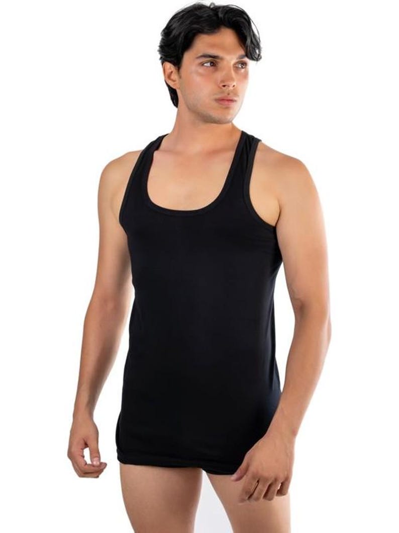 May include: A black sleeveless undershirt with a scoop neck.