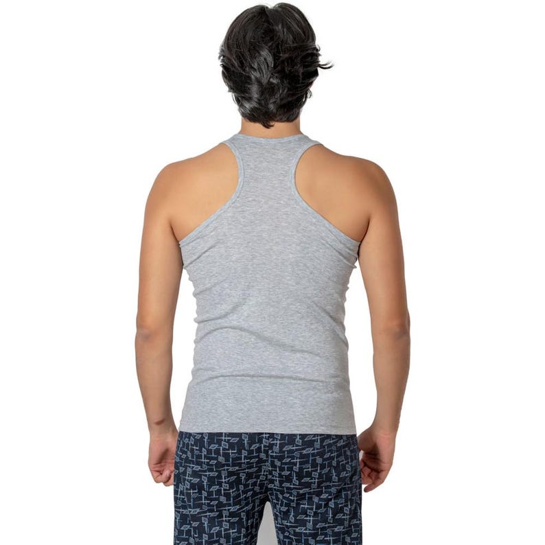 May include: A grey sleeveless undershirt with a racerback design. The shirt is made of a soft, comfortable material.
