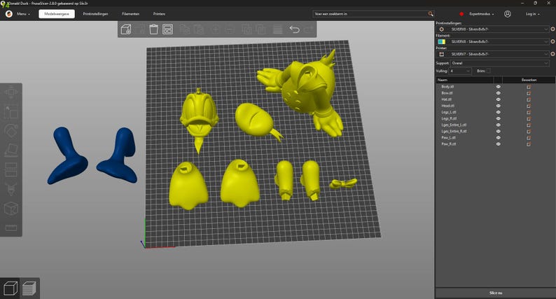 Puede incluir: Un modelo 3D de un pato de dibujos animados amarillo, dividido en piezas separadas para impresi&oacute;n 3D. Las piezas incluyen la cabeza, el cuerpo, las alas y los pies. El modelo est&aacute; listo para ser impreso y ensamblado.