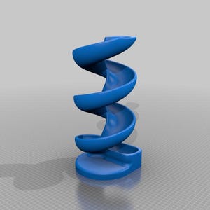 Puede incluir: Un juguete de pl&aacute;stico azul en espiral con una base. El juguete est&aacute; dise&ntilde;ado para permitir que los objetos peque&ntilde;os rueden por la espiral.