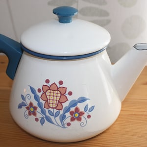 Vintage Enameled Kettle Sweden, white-based body, blue handle with retro floral pattern, Enamel Pot produced by Kockum of Sweden, 1960s