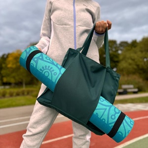 Versatile dark green yoga bag for yoga or meditation mat.