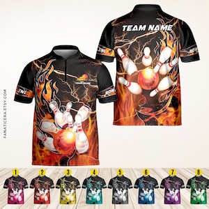 May include: A black bowling jersey with a flame and lightning bolt design. The jersey has the text "TEAM NAME" on the back and "YOUR NAME" on the front. The jersey is shown in eight different color variations.