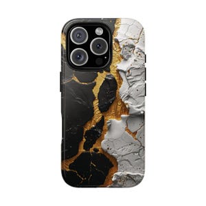 May include: A smartphone case with a unique design. The case features a black, gold, and white abstract pattern. The top of the case has a camera module with three lenses and a flash.
