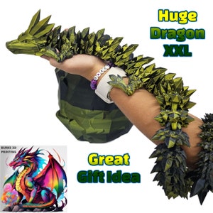 May include: A large, green, 3D printed dragon model. The dragon is posed with its head up and its tail curled around a person's arm. The text "Huge Dragon XXL" is written in large letters above the dragon. The text "Great Gift Idea" is written below the dragon.