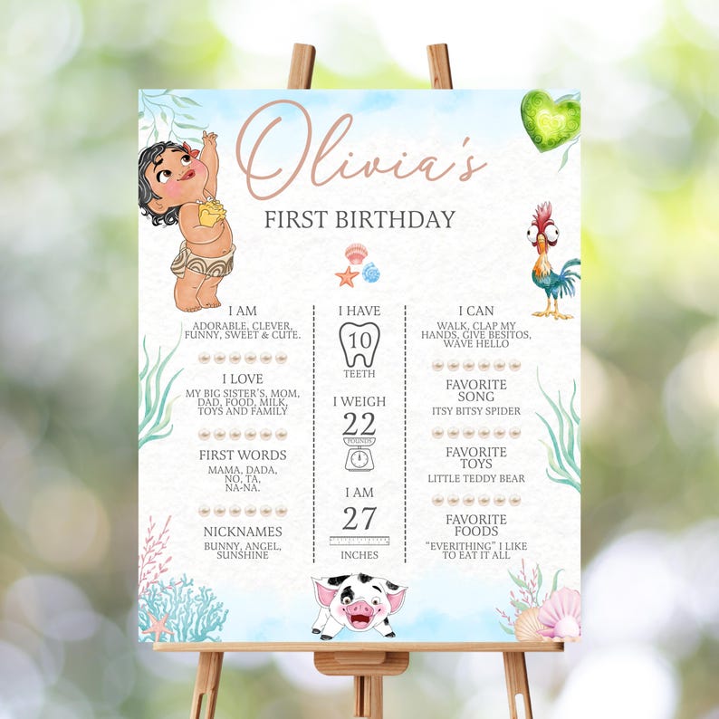 May include: A rectangular birthday milestone sign featuring the text Olivia's FIRST BIRTHDAY, illustrated with a cartoon baby, a rooster, and a piglet. The sign includes sections for teeth, weight of 10 kg, and height of 69 cm, with sea-themed accents.