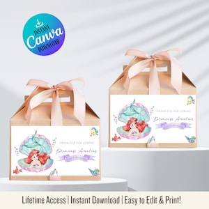 May include: Two light brown gift boxes with pink ribbon handles. Each box has a label featuring a mermaid in a seashell, with text that reads "Thank You For Coming Princess Amelia's Fourth Birthday!" A Canva download logo is in the top left.