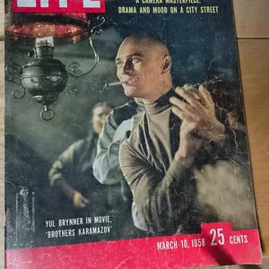 May include: A March 10, 1958 issue of LIFE magazine featuring Yul Brynner on the cover. The cover text reads U.S. GAMBLING MOB IN CUBA, NEW UPSETS ON A TROUBLED ISLAND, A CAMERA MASTERPIECE: DRAMA AND MOOD ON A CITY STREET, and YUL BRYNNER IN MOVIE, BROTHERS KARAMAZOV.