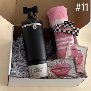 Black Bow Holiday Gift Box
30 oz Black Stanley
Straw Topper
Initial Tumbler Handle Charm
Pink Turkish Throw
Checkered Hair Claw
Eye Mask
Lip Mask