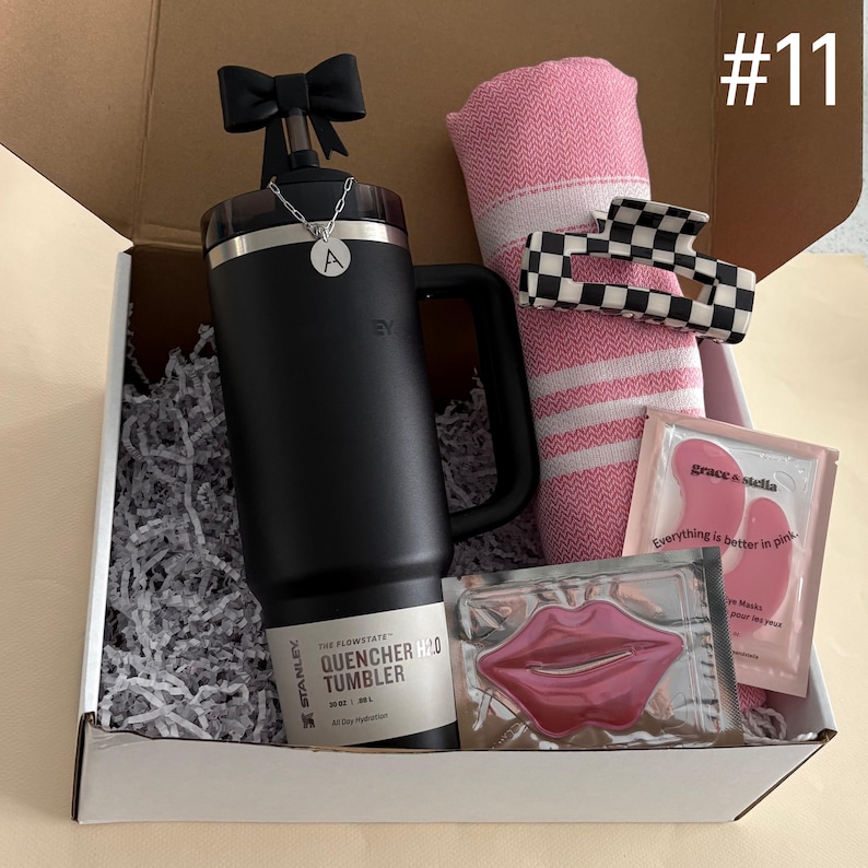 Black Bow Holiday Gift Box
30 oz Black Stanley
Straw Topper
Initial Tumbler Handle Charm
Pink Turkish Throw
Checkered Hair Claw
Eye Mask
Lip Mask