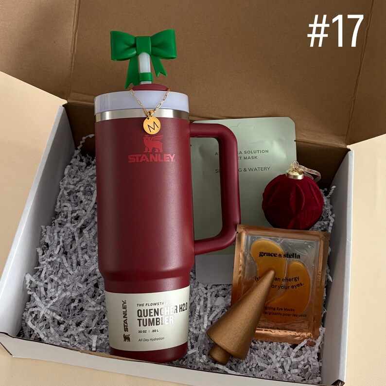 Christmas Self Care Package Teen 
Includes:
30 oz Cranberry Stanley
Straw Topper
Initial Tumbler Handle Charm
Face Mask
Eye Mask
Gold Christmas Tree
Velvet Ornament