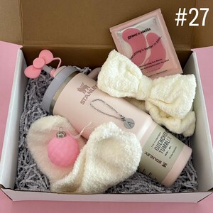 Christmas Gift Box With Pink Velvet Ornament
30 oz Rose Quartz Stanley
Straw Topper
Initial Tumbler Handle Charm
Spa Headband
Eye Mask
Fuzzy Socks
Pink Velvet Ornament