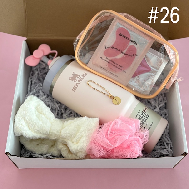 Sister Water Bottle Stanley Tumbler Gift Box Includes:
30 oz Rose Quartz Stanley
Straw Topper
Initial Tumbler Handle Charm
Spa Headband
Pink Shower Pouf
Clear Cosmetic Pouch
Eye Mask
Lip Mask