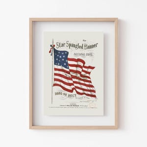 A vintage american flag printable wall art print of the star spangled banner song cover. This print features an american flag blowing in the wind. A patriotic red white and blue print to honor the usa for the 4th of july / independence day. This print is offered as a digital download printable wall art.