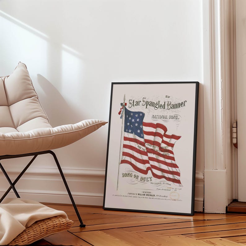 A vintage american flag printable wall art print of the star spangled banner song cover. This print features an american flag blowing in the wind. A patriotic red white and blue print to honor the usa for the 4th of july / independence day. This print is offered as a digital download printable wall art.