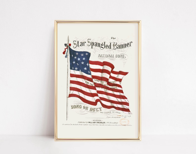 A vintage american flag printable wall art print of the star spangled banner song cover. This print features an american flag blowing in the wind. A patriotic red white and blue print to honor the usa for the 4th of july / independence day. This print is offered as a digital download printable wall art.