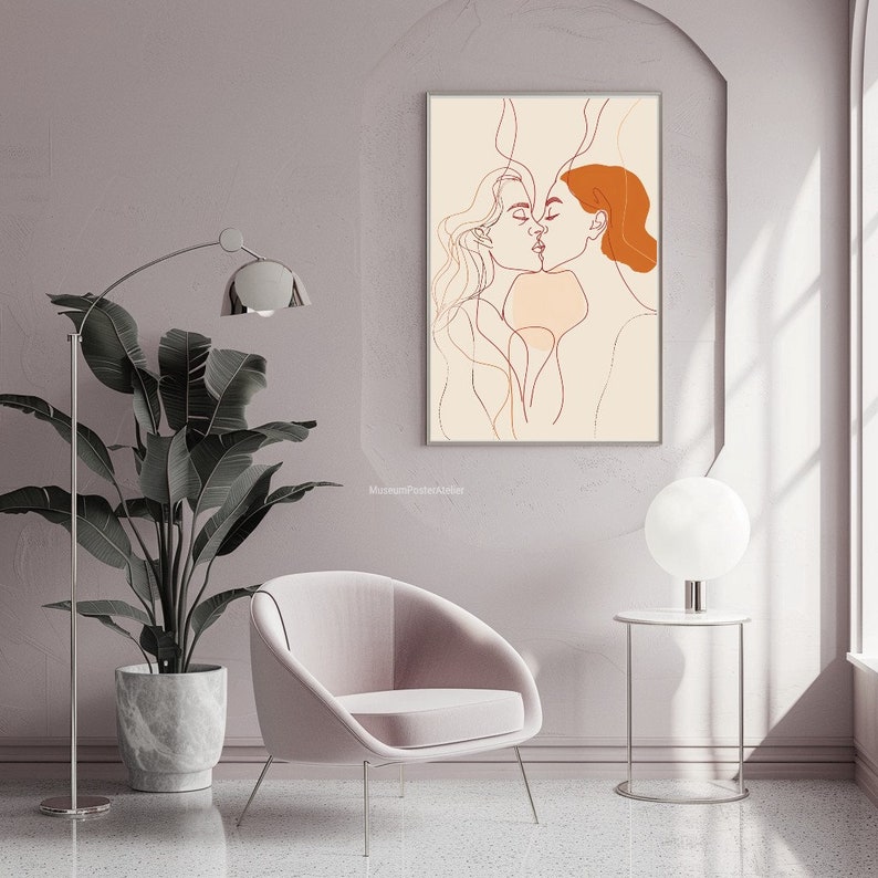 May include: A minimalist line art print of two people kissing. The artwork is in shades of brown and orange on a cream background.