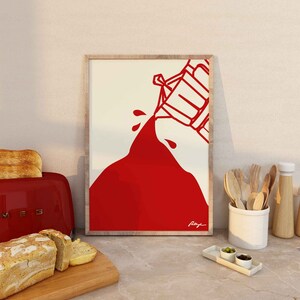 May include: A framed illustration of a red pitcher pouring red liquid onto a white background. The artist's signature is visible in the bottom right corner.