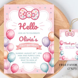 May include: A pink and white invitation for a first birthday party. The invitation features a bow, balloons, and the text "Hello Olivia's First Birthday". A matching favor tag is included.