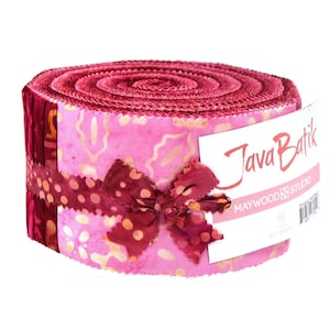 May include: A roll of pink and red fabric with a white label that says "Java Batik" and "Maywood Studio".