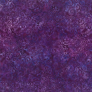 May include: Purple fabric with a repeating pattern of swirls and circles. The fabric has a batik style design.