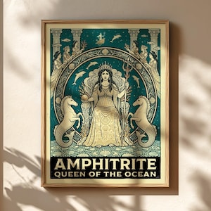 May include: A framed art print depicting Amphitrite, Queen of the Ocean. The artwork shows a woman in a golden gown, holding a trident, with seahorses on either side. The background is teal with dolphins and figures. The text "AMPHITRITE QUEEN OF THE OCEAN" is at the bottom.