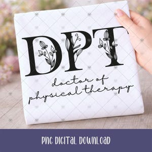 May include: A white t-shirt featuring the black text DPT in a large serif font with floral line art integrated into each letter. Below the letters, the text doctor of physical therapy is written in a smaller, black cursive script font.