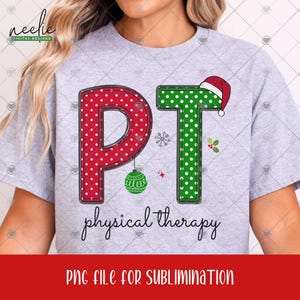 May include: A grey t-shirt with the letters "PT" in red and green polka dots, with a Santa hat on the "T". The words "physical therapy" are written below in cursive. A green bauble and snowflake are also included.