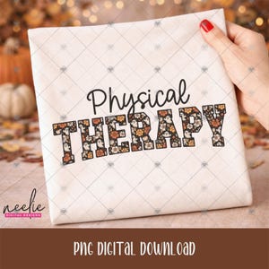 May include: A white fabric surface featuring the black text Physical THERAPY. The word Physical is in a script font, while THERAPY is in a block font filled with a pattern of small white ghosts, orange flowers, and brown leaves on a black background.