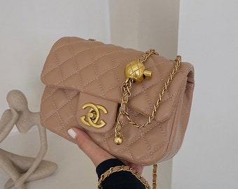 Bolso con textura de alta calidad para mujer, bandolera de hombro con cadena rombos estilo Chanel, bolso Popular para mujer 2024