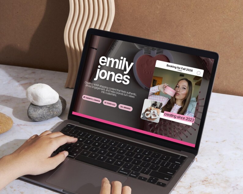 Editable Canva creator website displayed on a desktop monitor featuring influencer branding, portfolio sections, service offerings, and professional website design.