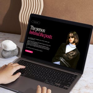 Lifestyle laptop mockup showing the Editorial Canva website displayed in a modern creative workspace.