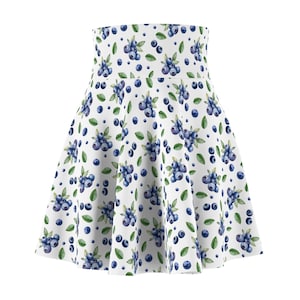 May include: A high-waisted skater skirt featuring a repeating watercolor print of dark blue blueberries and small green leaves on a white background. The skirt has a flared silhouette with a wide waistband and a consistent pattern throughout the fabric.