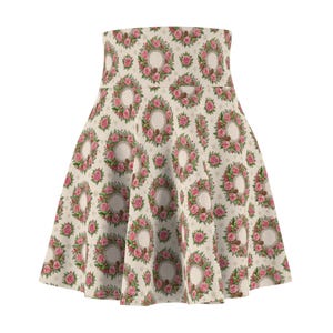 May include: A high-waisted skater skirt featuring an all-over print of circular floral wreaths. The pattern consists of pink roses, green leaves, and brown pinecones arranged in repeating circles against a light cream background with small dots.