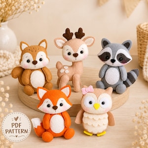May include: Five felt animal plushies including a brown squirrel, a tan deer with antlers, a gray raccoon, an orange fox, and a beige owl with a pink bow. A circular white label in the corner features the text PDF PATTERN with small heart icons.
