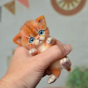 Orange tabby kitten with blue eyes. Collectible cat sculpture.  Pet memory gift