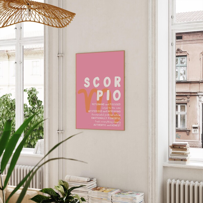 May include: Pink and orange printable poster with the zodiac sign Scorpio and a description of Scorpio personality traits. The text reads: "SCORPIO DETERMINED and FOCUSED Loyal to the core MYSTERIOUS and INTRIGUING EMOTIONALLY POWERFUL Feels everything deeply AUTHENTIC and HONEST"