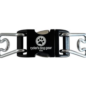 May include: Black dog collar buckle with silver-colored metal attachments. The buckle has the text "ryder's dog gear" and a paw print logo. The product is labeled "RD6".