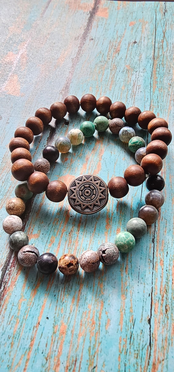 Bracelet set with wooden bead and aqua and natural colored beads on durable stretch material for comfort and all day wear