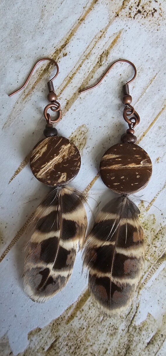 Pheasant feather earrings complimented with wooden accent beads